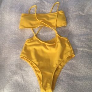 Bright yellow. Two piece, high waisted bottoms